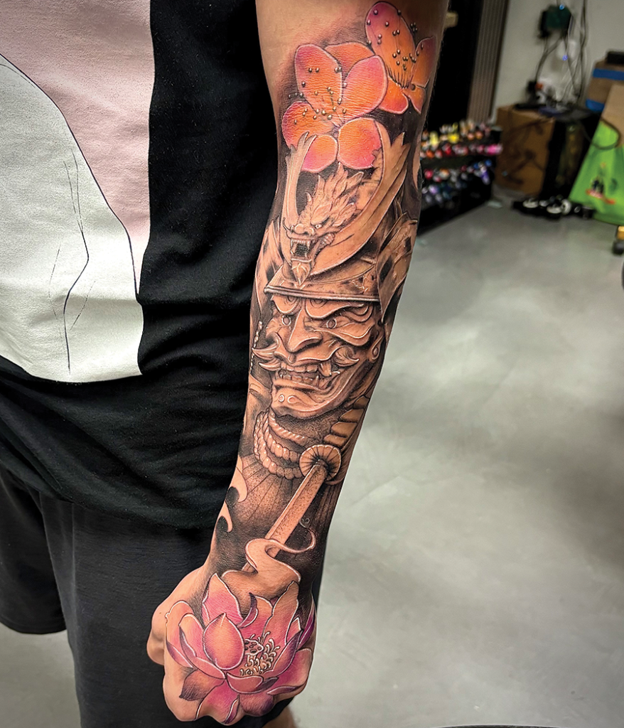 dragon and flower sleeve tattoo