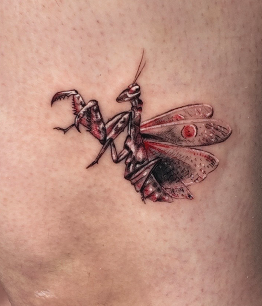 praying mantis tattoo close up