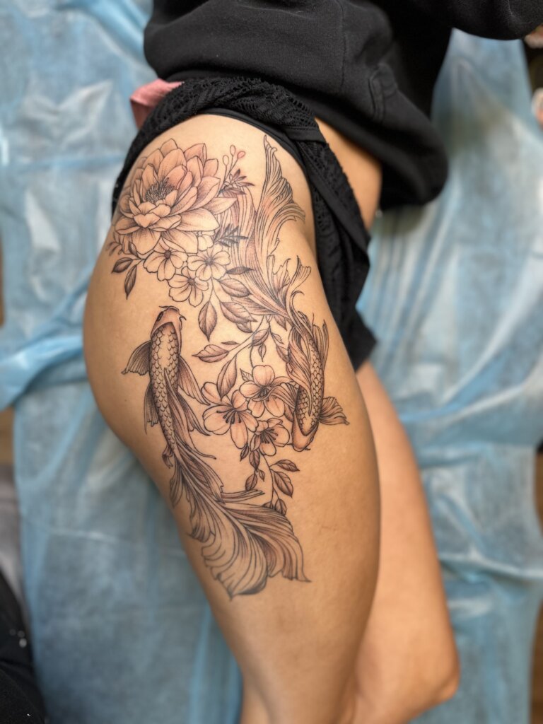 koi fish tattoo on hip