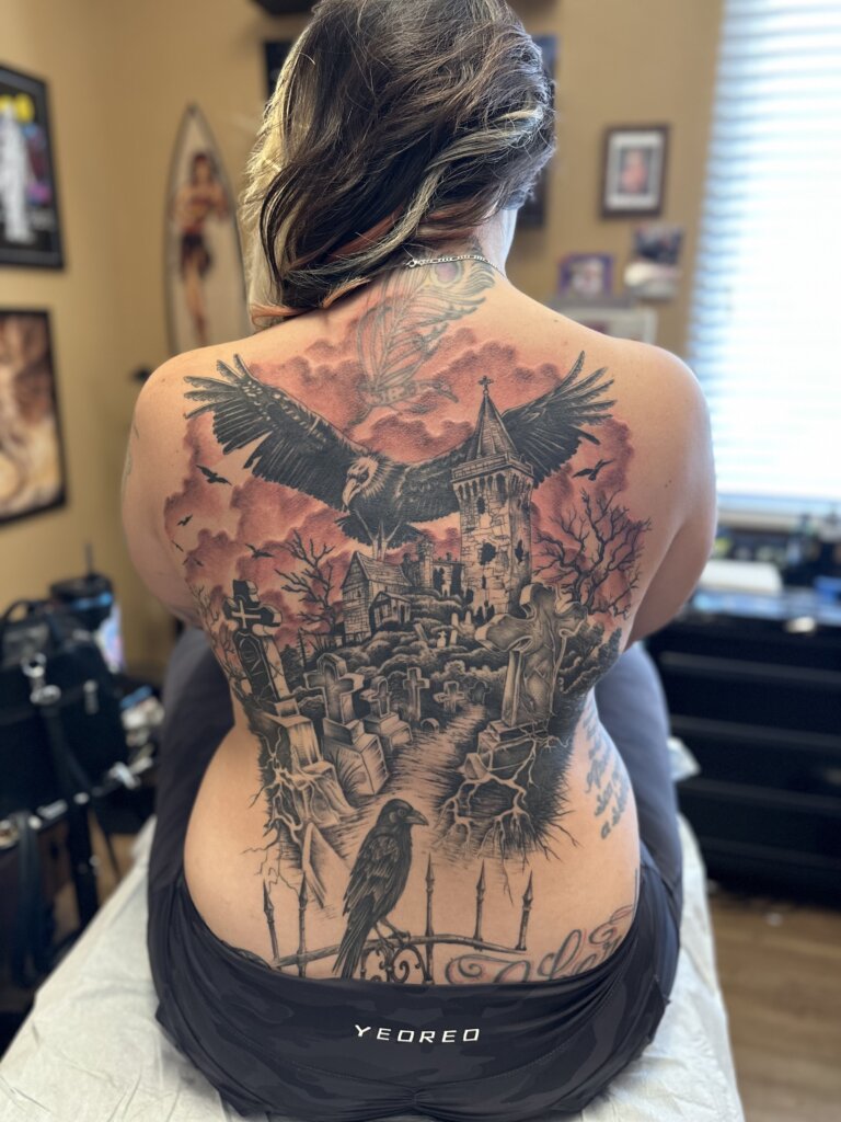 graveyard tattoo on back