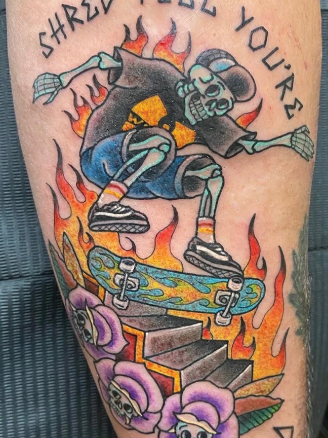 skeleton on skateboard tattoo