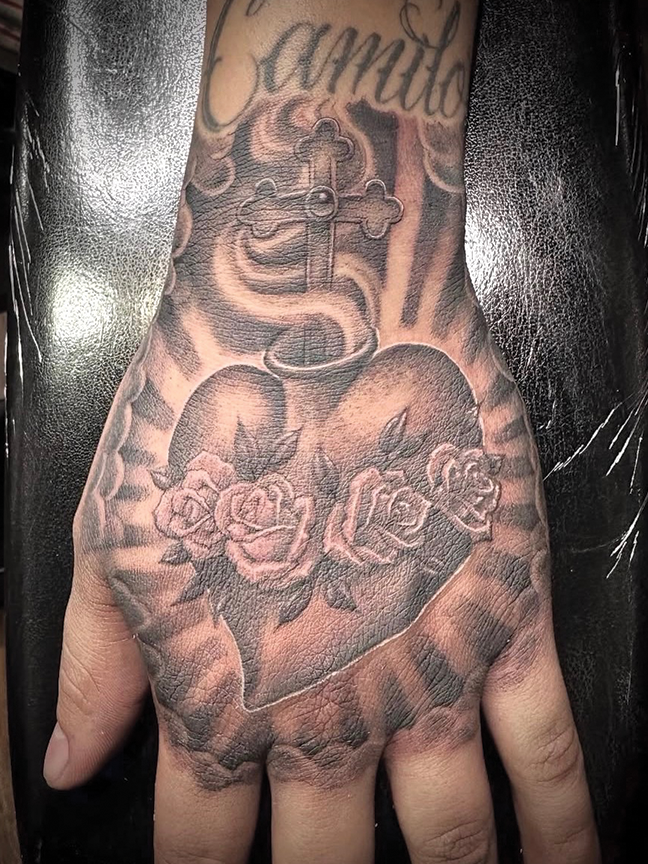 heart hand tattoo