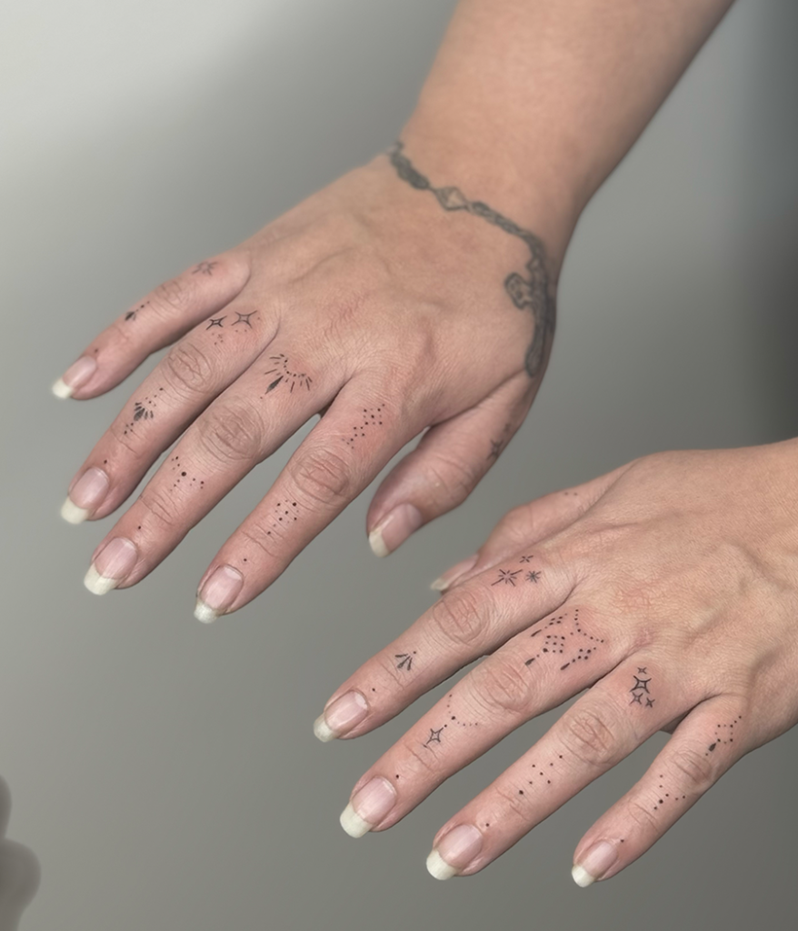 tiny tattoos on hand