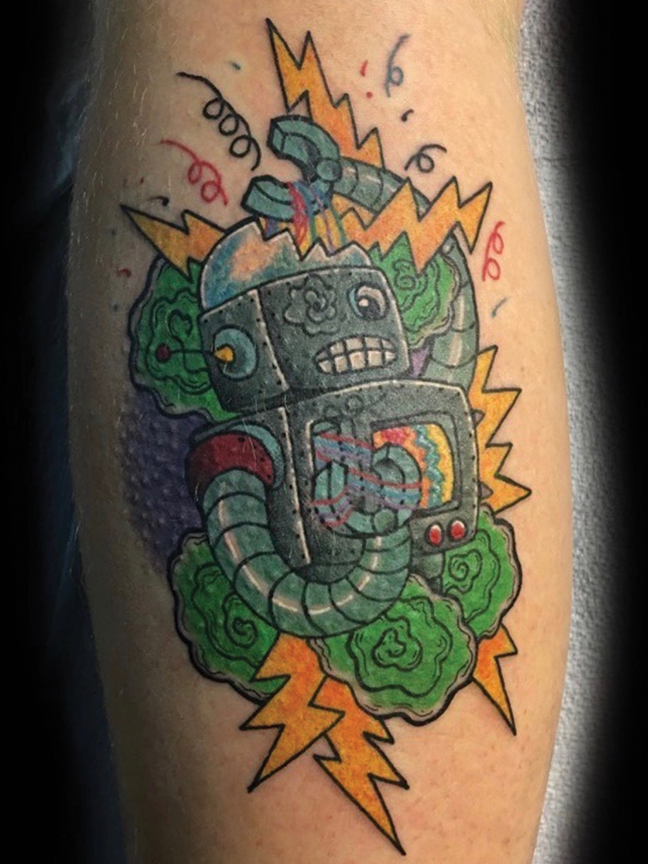 robot tattoo on leg