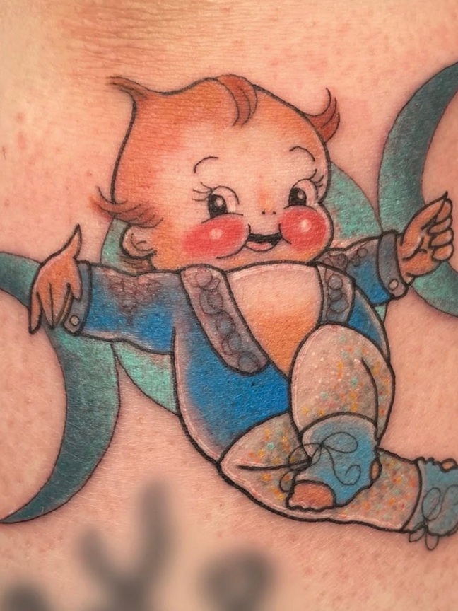 baby cherub tattoo