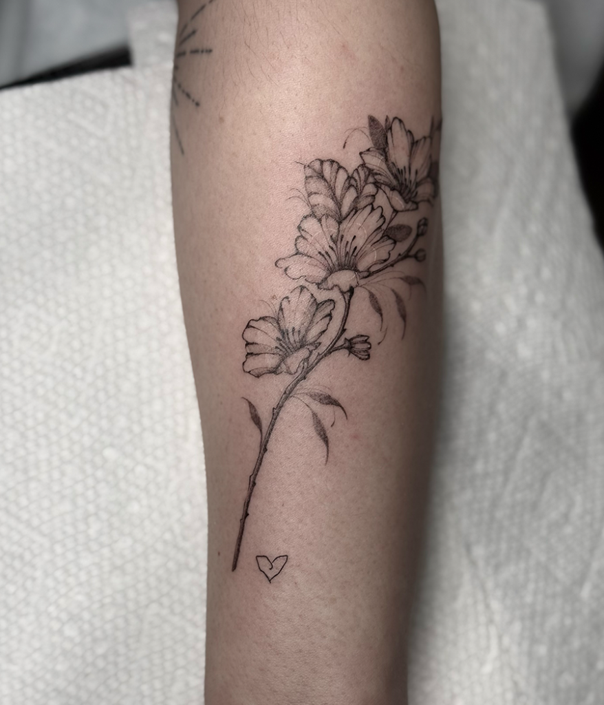 flower tattoo on arm