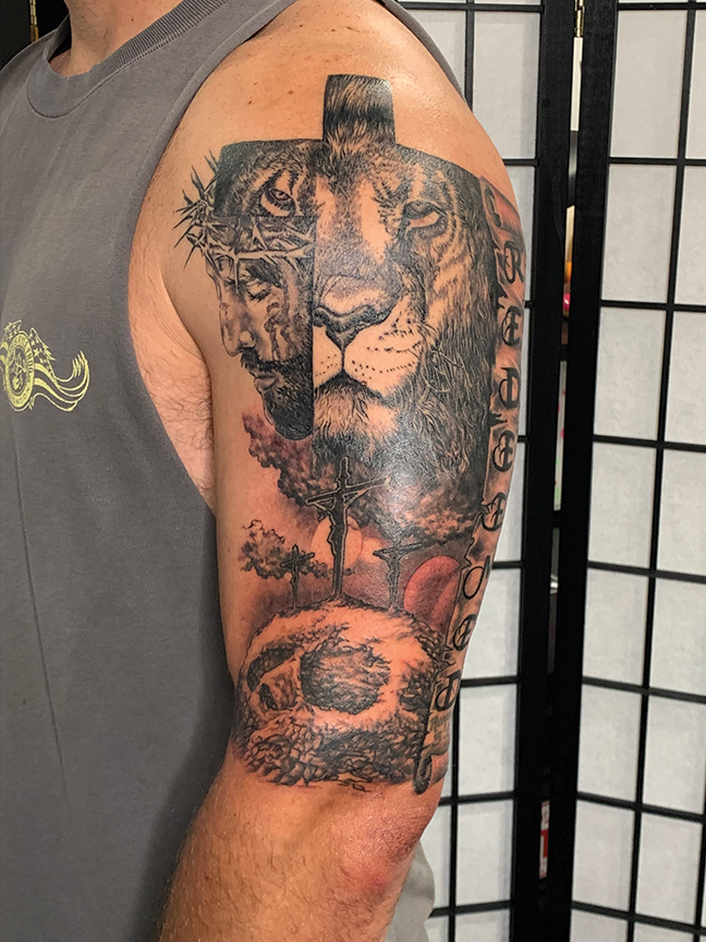 Lion tattoo on arm
