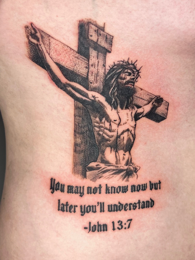 Script quote tattoo on arm
