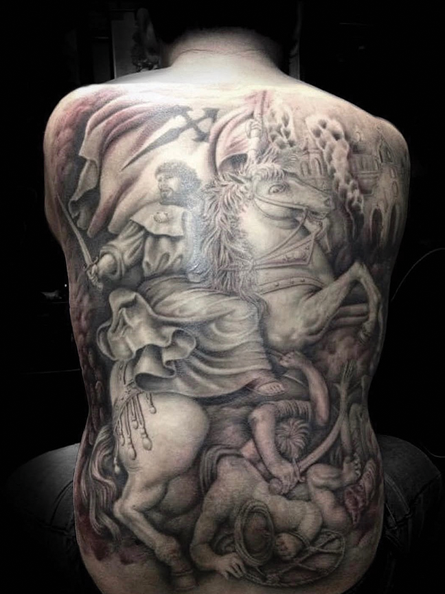 knight on a horse tattoo on back