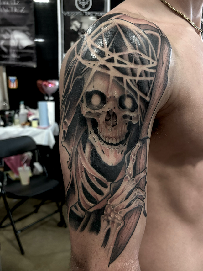 skull tattoo on arm