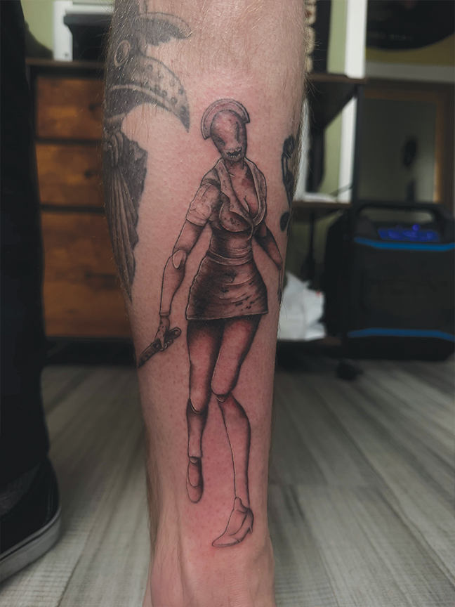 zombie nurse tattoo on leg