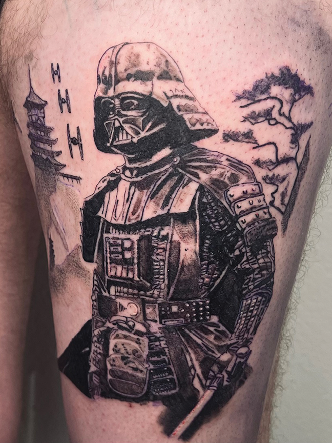 Darth Vader portrait tattoo on arm