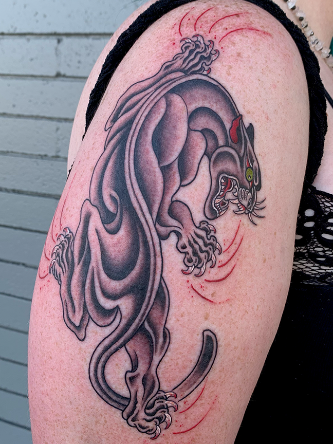 panther tattoo on arm