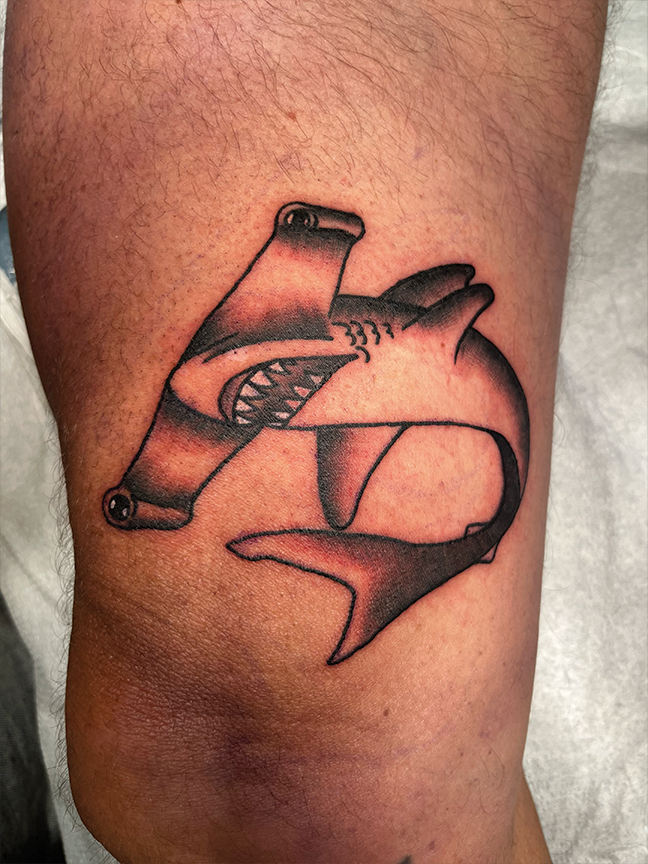 Hammerhead shark tattoo on leg