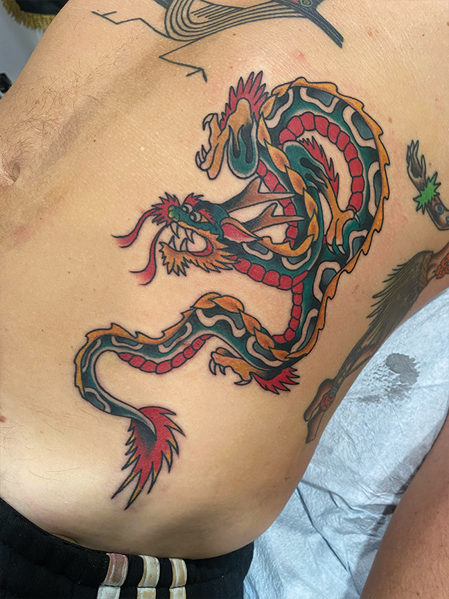 Dragon tattoo on torso