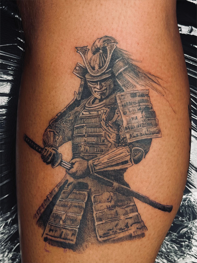 Samurai warrior tattoo on arm